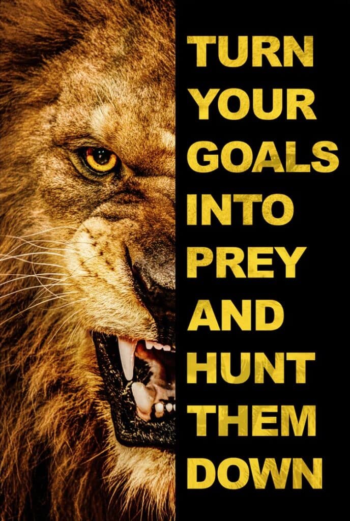 A lion growls at the viewer. On the side is a quote: "Turn your goals into prey and hunt them down."