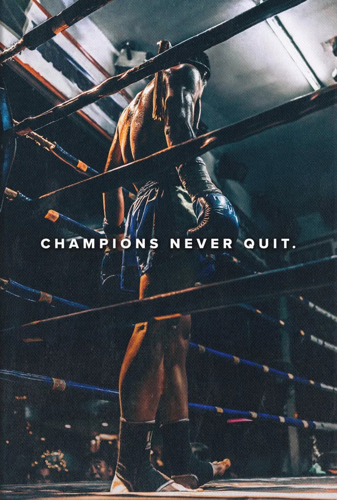 Motivational canvas of a boxer with the text CHAMPIONS NEVER QUIT. 